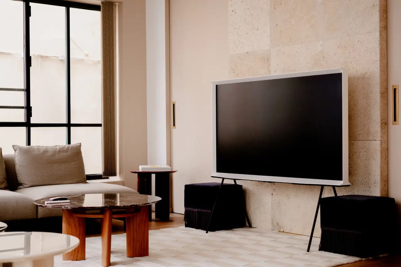 Modern living room in a Grands Boulevards Paris apartment by The Babylon Stay, featuring contemporary furniture and a stylish interior